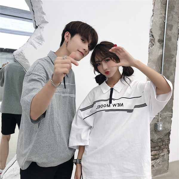 Nyári unisex póló gallérral és cipzárral