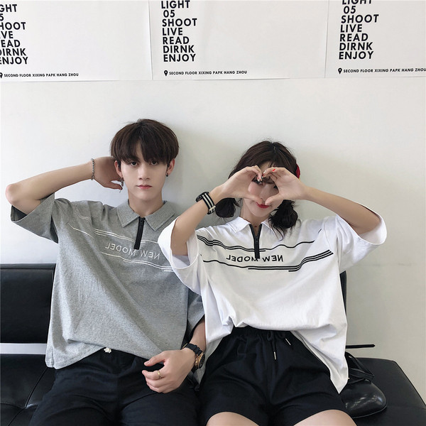 Nyári unisex póló gallérral és cipzárral