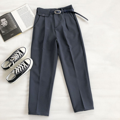 Modern női nadrág övvel és zsebbel