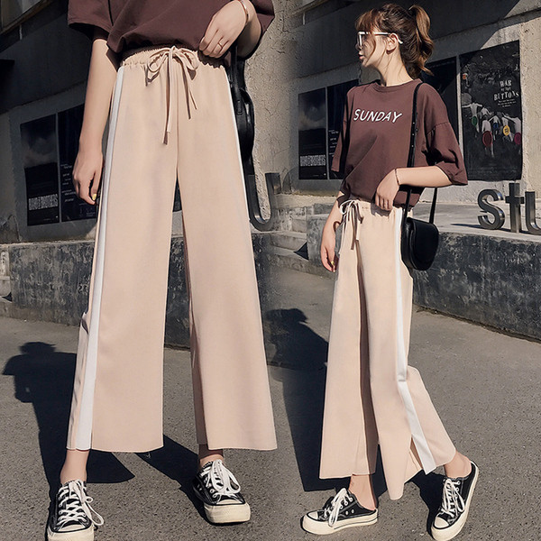 Női sportnadrág fehér szegéllyel és 9/10 hosszban