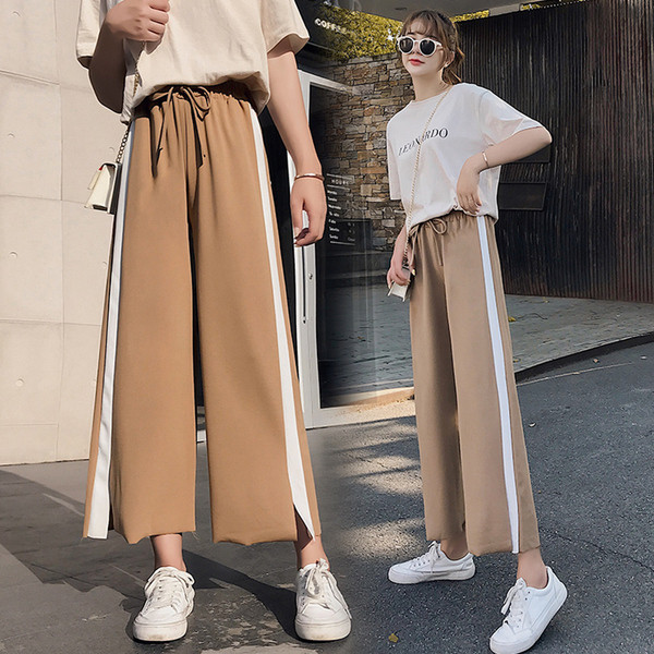 Női sportnadrág fehér szegéllyel és 9/10 hosszban