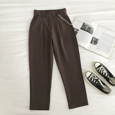 Μοντέρνο γυναικείο παντελόνι με μεταλλική αλυσίδα και ελαστικό