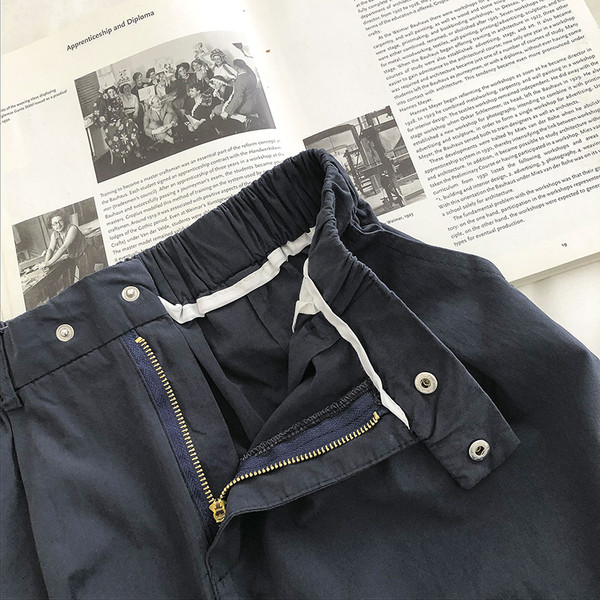 Γυναικείο παντελόνι με ψηλή μέση και κουμπιά - φαρδύ μοντέλο