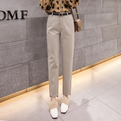 Ženske hlače - ravni model s džepovima i standardnim strukom