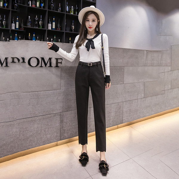 Ženske hlače - ravni model s džepovima i standardnim strukom