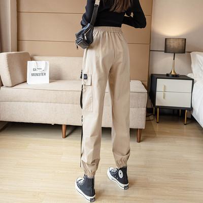 Női sportnadrág zsebekkel - széles modell