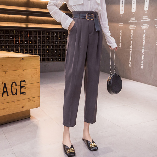 Moodsad naistepüksid pikkusega 9/10 ja vööga