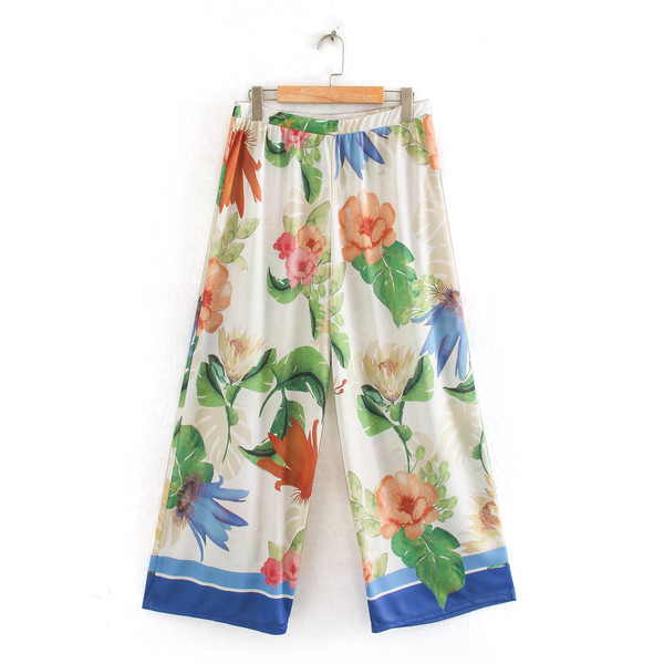 Naiste lilledega ja kummiga püksid