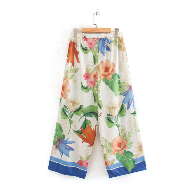 Naiste lilledega ja kummiga püksid