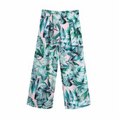 Lillemustri ja kõrge vöökohaga naiste püksid