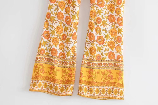 Női nadrág virágokkal és magas derékkal - egyenes modell