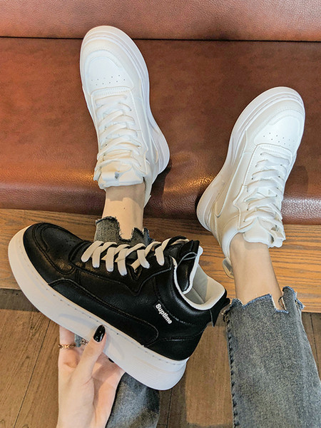 Öko-nahast kõrged naiste tossud kirja ja paeltega