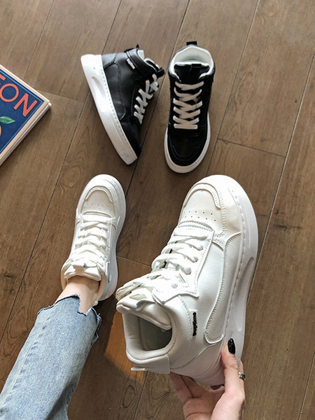 Öko-nahast kõrged naiste tossud kirja ja paeltega