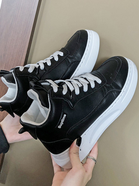 Öko-nahast kõrged naiste tossud kirja ja paeltega