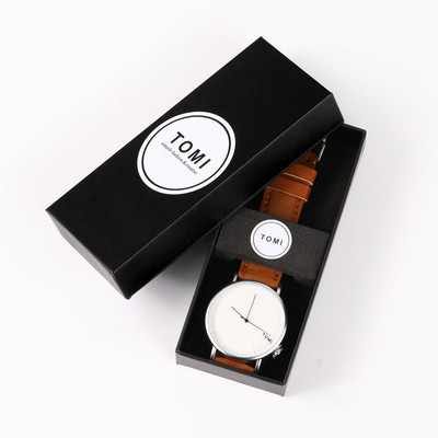 Μοντέρνο γυναικείο ρολόι σε στρογγυλό σχήμα και δερμάτινο λουράκι