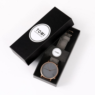 Μοντέρνο γυναικείο ρολόι σε στρογγυλό σχήμα και δερμάτινο λουράκι