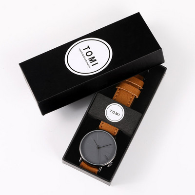 Μοντέρνο γυναικείο ρολόι σε στρογγυλό σχήμα και δερμάτινο λουράκι