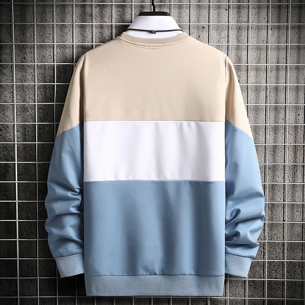 Modern blúz hímzéssel és ovális nyakkivágással