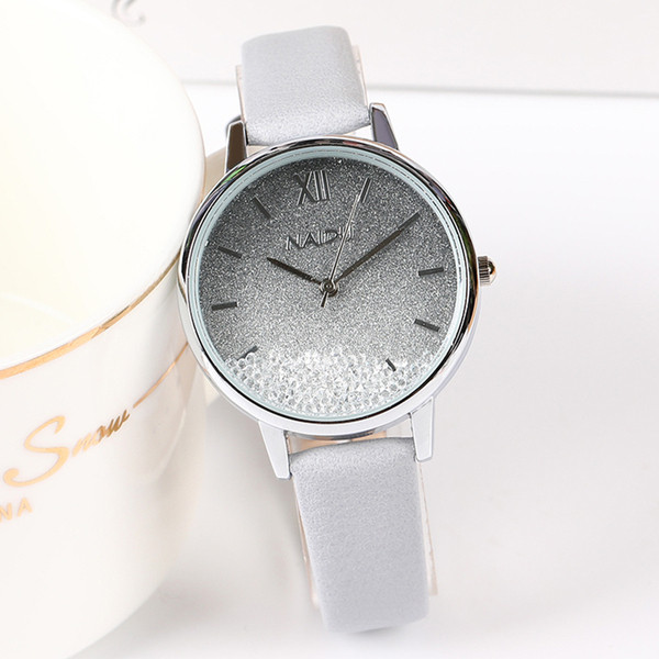 Ženski sat s kožnim remenom i kamenčićima