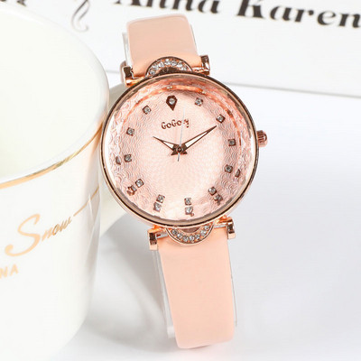 Ženski sat s tankim kožnim remenom i ukrasnim kamenčićima