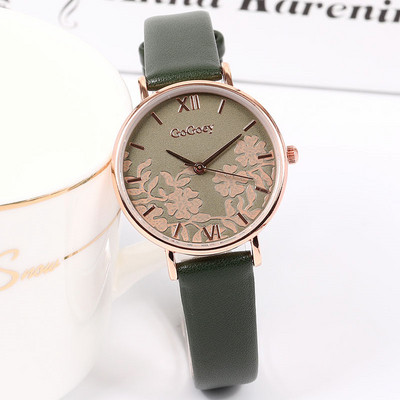 Nahast rihmaga ümmargune naiste käekell