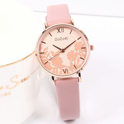 Nahast rihmaga ümmargune naiste käekell