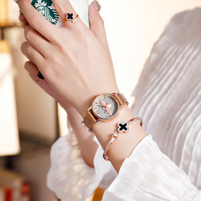 Naiste ümara kujuga metallist käekell