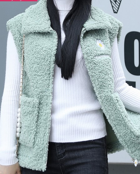 Női pehelymellény zsebekkel és cipzárral