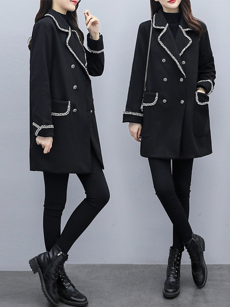 Modern női kabát fekete színben, gombokkal és zsebekkel