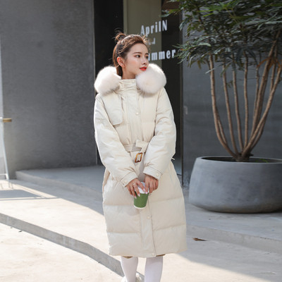 Hosszú női kabát övvel, kapucnival