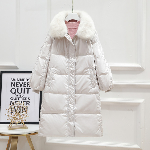 Naiste pikk nööpide ja taskuga jope