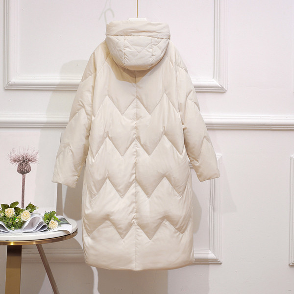 Új modell téli női kabát kapucnival és gombokkal