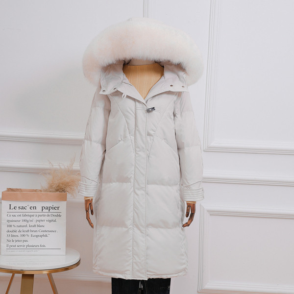 Μακρύ γυναικείο μπουφάν με φερμουάρ και κουκούλα 