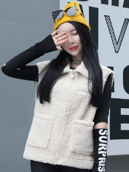 Női pehelymellény zsebekkel