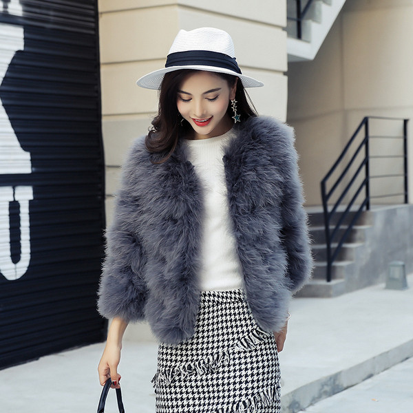 Модерно есенно-зимно палто от пух