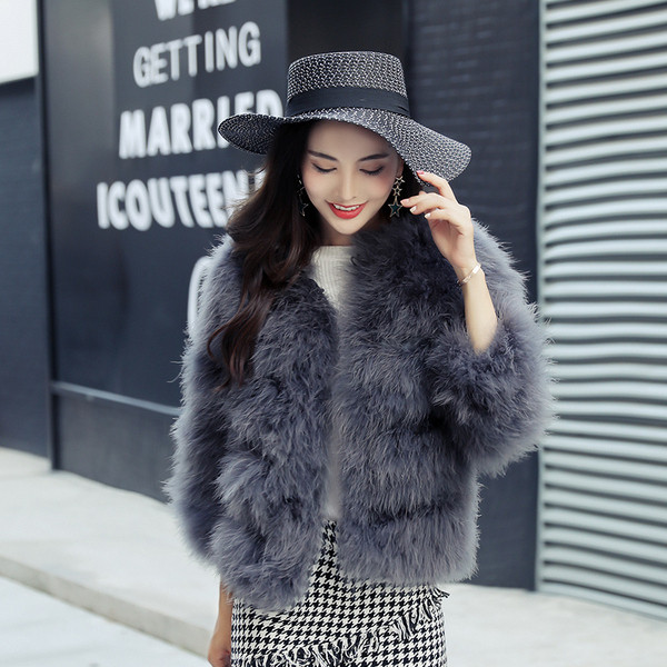 Модерно есенно-зимно палто от пух