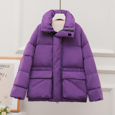 Lühike naiste jakk taskute ja kõrge kraega