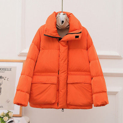 Lühike naiste jakk taskute ja kõrge kraega