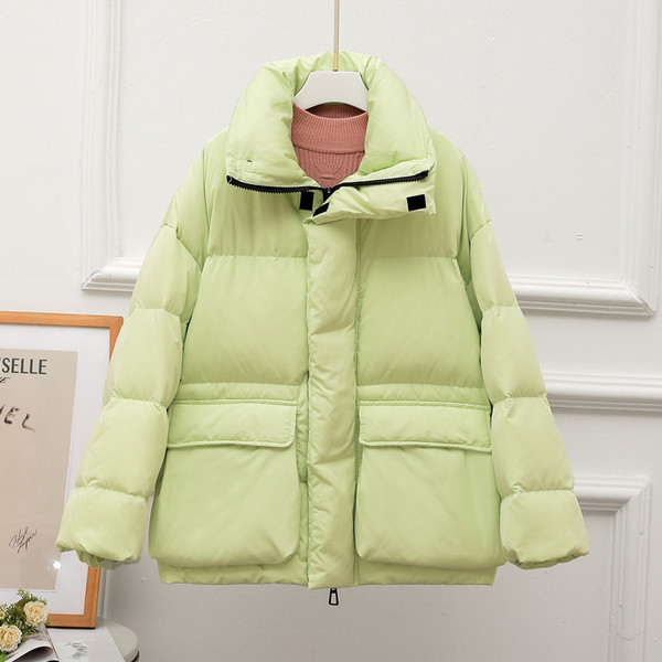 Lühike naiste jakk taskute ja kõrge kraega