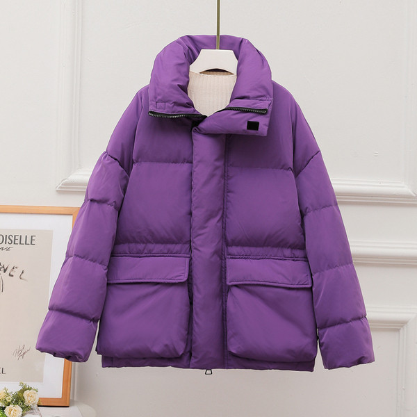 Lühike naiste jakk taskute ja kõrge kraega