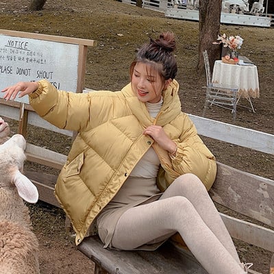 Γυναικείο χειμερινό μπουφάν με κουκούλα και τσέπες