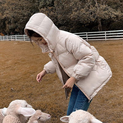 Γυναικείο χειμερινό μπουφάν με κουκούλα και τσέπες