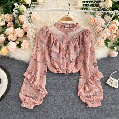 Lillemustri ja lokkidega naiste särgid