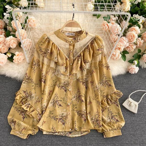 Lillemustri ja lokkidega naiste särgid