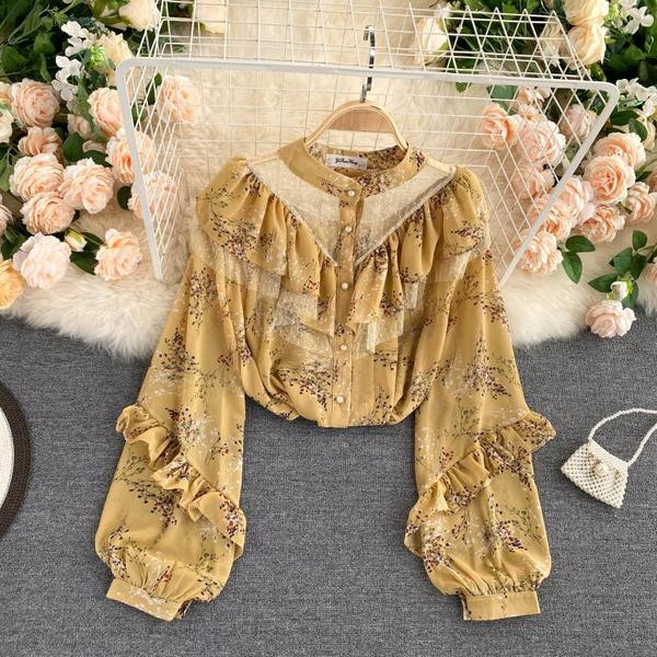 Lillemustri ja lokkidega naiste särgid