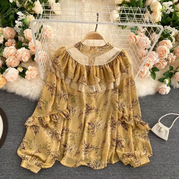 Lillemustri ja lokkidega naiste särgid