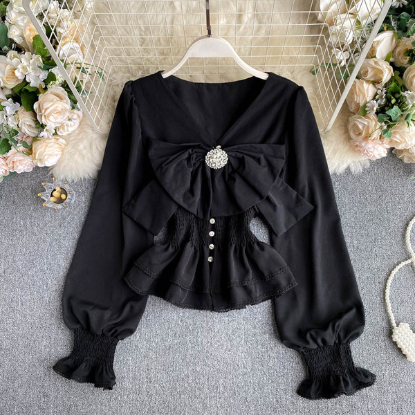 Stiilne naiste särk paela ja spitsikaelusega