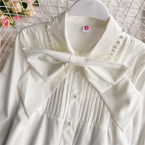 Γυναικείο πουκάμισο με κορδέλα, κουμπιά και μακριά μανίκια