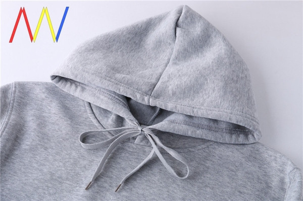 Őszi pulóver sima modell kapucnival