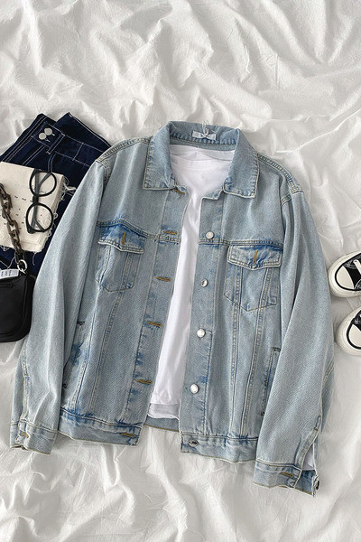 Naiste nööpide ja taskutega teksajakk